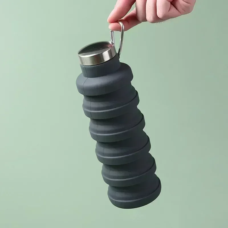 Collapsible bottle held in hand